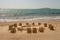 Beautiful gold ocean beach with yellow sand with Castle and towers is in the photo