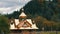 Beautiful golden orthodox church in mountains. The highest mountain village in Ukraine, Dzembronya