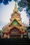 Beautiful golden pagoda with decorative Thai style fine art at public Buddhist Wat Phu Phlan Sung, Nachaluay, Ubon Ratchathani, Th