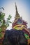 Beautiful golden pagoda with decorative Thai style fine art at public Buddhist Wat Phu Phlan Sung, Nachaluay, Ubon Ratchathani, Th