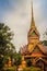 Beautiful golden pagoda with decorative Thai style fine art at public Buddhist Wat Phu Phlan Sung temple, Nachaluay, Ubon Ratchath