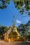 Beautiful golden pagodas at Wat Phra That Doi Tung, Chiang Rai. Wat Phra That Doi Tung comprises of a twin Lanna-style stupas, one