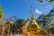 Beautiful golden pagodas at Wat Phra That Doi Tung, Chiang Rai. Wat Phra That Doi Tung comprises of a twin Lanna-style stupas, one