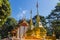 Beautiful golden pagodas at Wat Phra That Doi Tung, Chiang Rai. Wat Phra That Doi Tung comprises of a twin Lanna-style stupas, one