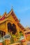 Beautiful golden patterned background on the Buddhist church gable end. Thai golden pattern background crafted on the gable in the