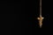 Beautiful golden pendulum with chain on background, space for text. Hypnosis session