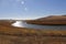 Beautiful golden prairie and a quiet winding river