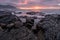 A beautiful golden seascape taken on a stormy cloudy morning at sunrise