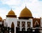 Beautiful golden yellow dome mosque in Ulakan, Pariaman, West Sumatra, Indonesia