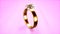 beautiful goldish wedding ring with diamond on gentle pink - object 3D rendering