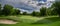 Beautiful golf course with green grass and cloudy sky. 3d rendering
