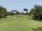 Beautiful golf course in Spain with bunkers, green and flag