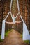 Beautiful and graceful trapeze artist performs exercises on aerial silk