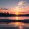 Beautiful gradient sunrise skies over the northern lake. Small waves and reflection in water. Dark forest on