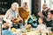 beautiful grandmother carrying turkey for family