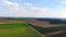 Beautiful grasslands and country landscape from above - aerial flight footage