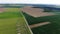 Beautiful grasslands and country landscape from above - aerial flight footage