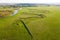 Beautiful grazing at river floodplain. Aerial drone view from above