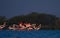 Beautiful greater flamingos on blue water