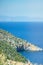 Beautiful Greek coastline next to sea shore during warm weather