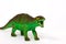 Beautiful green ankylosaurus stands on a white background