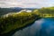 The beautiful green and blue lakes of Rotorua New Zealand from a drone aerial landscape shot.