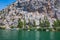 Beautiful green canyon of the river Cetina with rocks, stones and reflection in a water, summer landscape, Omis