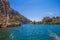 Beautiful green canyon of the river Cetina with rocks, stones and reflection in a water, summer landscape, Omis