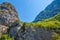 Beautiful green canyon of the river Cetina with rocks, stones and reflection in a water, summer landscape, Omis