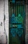 Beautiful green gate door, old city detail