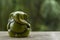 Beautiful green lord Ganesha statue with natural background