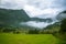 A beautiful green mountain valley near Rosendal in Norway. Autumn landscape in Folgefonna national park.