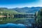 Beautiful green mountainous scenery reflecting in the Lost Lake, Whistler, BC Canada