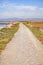 Beautiful green path on an autumn day in the marshes of East San Francisco Bay, Hayward, California