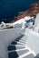Beautiful grey and white steps and Aegean sea in Oia, Santorini, Greece.