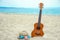 Beautiful guitar on the sand by the Greek sea