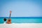 A beautiful guitar on the sand by the Greek sea