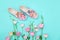 Beautiful gumshoes among eustoma flowers on bright background