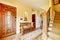 Beautiful hallway with rustic and wicker storage seat