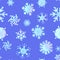 Beautiful hand drawn seamless painting with snowflakes on blue background. Endless repeating wallpaper with snow