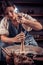 Beautiful handicraftsman making ceramic pot on the pottery wheel . Craft manufacture.