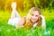 Beautiful happy dreamy woman in summer on nature lying on grass