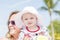 Beautiful Happy Expressive Blond Girl Toddler on the Beach