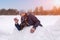 Beautiful happy girl in winter in warm clothes. Close-up. Artistically colored photography