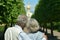 Beautiful happy mature couple traveling. back view