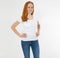 Beautiful happy red hair girl in white t-shirt isolated. Pretty smile red head woman in tshirt mock up, blank
