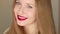 Beautiful happy smiling woman with long hair wearing red lipstick make-up, beauty blogger, influencer video stories reels for