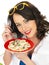 Beautiful Happy Young Woman Holding a Plate of Spaghetti Carbonara Cream Pasta