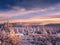 Beautiful harsh snow covered scenic landscape of a mountain range of Jeseniky mountains in late afternoon