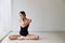 Beautiful healthy asian woman in ballet dress enjoying in meditates with yoga pose at home with relaxation